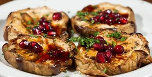 Baked eggplant with pomegranate sauce